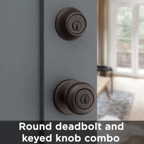 Cove Entry Knob And Single Cylinder Deadbolt Combo Pack In Venetian Bronze on door, showing keyed knob and deadbolt.