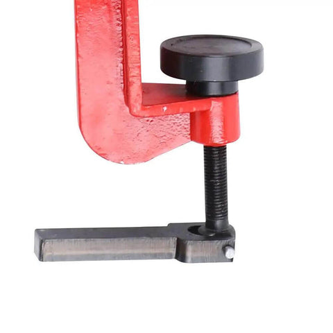 Close-up of Bead Roller Machine With 7 Inch Throat And Six Die Sets in red for sheet metal fabrication and auto body work.