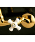 Close-up of Check Out This Super Cool Solid Brass Two Handle Wall Mount Kitchen Faucet In Trendy Brushed Brass With Drip Free Ceramic Disc Cartridge Easy Install Adjustable Centers Perfect For Traditional Homes handle detail.