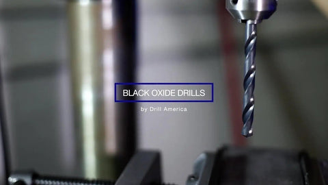 Built Tough Badass Thirty Three Piece High Speed Steel Reduced Twist Drill Bit Set Featuring A Sharp Black Oxide Coating and Round Shanks displayed in a workshop setting.