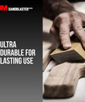 Hand using Dual Angle Sanding Sponge 320 Grit For Wet Or Dry Use with professional-grade foam; angled sides for detailing