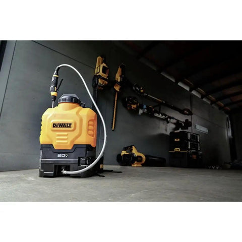 20V Lithium-Ion Battery Powered Backpack Sprayer Tool Only 4 Gallon Tank Workhorse next to power tools in storage area