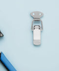 Stainless Steel Spring Loaded Toggle Latches 10 Pack Heavy Duty Quick Release Pull Handles For RV Cabinets, Travel Bags, And Outdoor Gear Case Closure Clasp Super Sturdy Design on light blue background.