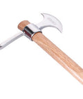 Close-up of stainless steel pickaxe gardening tool for heavy duty digging and soil breaking, rust resistant handheld mattock for planting, weeding