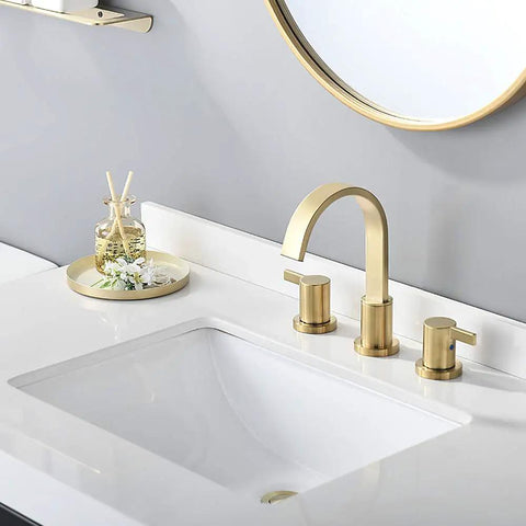 Two Handles 8 Inch Widespread Bathroom Faucet In Brushed Gold Finish With Valve And Metal Pop Up Drain Three Hole Mount Eight Inch Center Spread Sleek Modern Diy Bathroom Upgrade displayed on white sink against gray wall