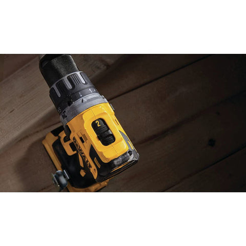 Compact 20V Max XR Li Ion Brushless Drill And Driver with dual speed settings in use for tight spaces.