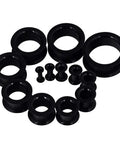 26 Piece Silicone Ear Tunnels Set 8G To 1 Inch Hollow Flexible Soft Ear Stretching Kit Black on white background