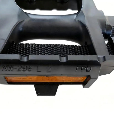 Close-up of Extra Wide Bike Pedals With Toe Clips And Straps, Nine Sixteenths Inch Oversized Platform with reflective strip.