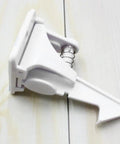 Close-up of Easy Install Cabinet Locks For Babyproofing 16 Pack White ABS Childproof Locks for cabinets and drawers