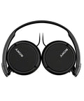 Go Anywhere Plug And Play Wired On Ear Headphones With Snug Foam Tips And Sturdy Swivel Cups Built For Long Commutes And Chill Vibes In Classic Black, top view.