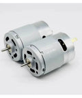 Two RS-385PH-18100 Mini Dual Shaft DC Motors, 6V-24V, High Speed 6200-24000 RPM, 28mm size, 2.3mm shaft, visible from side angle.