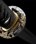 Close-up of 40 Inch Japanese Iaito For Training With Dull Blade Handmade Full Tang Practice Sword's ornate tsuba and handle.