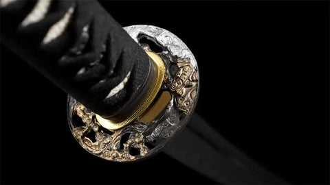 Close-up of 40 Inch Japanese Iaito For Training With Dull Blade Handmade Full Tang Practice Sword's ornate tsuba and handle.