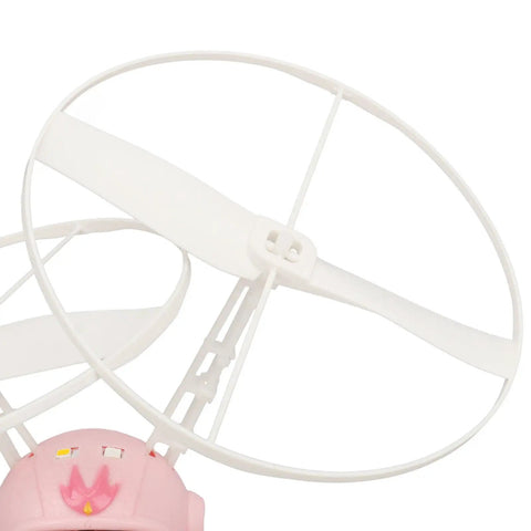 Top view of Hand Controlled Flying Toy For Kids With Dual Blades USB Rechargeable Battery 75mAh Built In Light Up Fun For Indoor And Outdoor Play Pink Totally Awesome Gift For Birthday Or Christmas Easy To Fly Lightweight Grip Safe For Kids Play