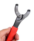 Hand holding Bottom Bracket Tool Adjustable Pin Spanner And Lock Ring Wrench For Bicycle Repair, Carbon Steel, 16.3 cm