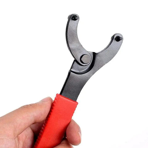 Hand holding Bottom Bracket Tool Adjustable Pin Spanner And Lock Ring Wrench For Bicycle Repair, Carbon Steel, 16.3 cm