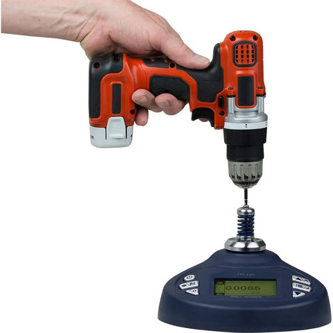 Torque Tool Tester With 20 Nm Capacity And LCD Display For Precision Testing Six Modes Track Peak First Peak Auto Peak Auto First Peak Double Peak Backlit Graphical Readout Reversible Display With Analog Bar Graph Preset Pass Fail LEDs USB RS232 Output shown testing a drill