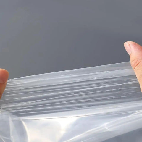 Clear Flower Water Bags Pro Grade 100 Pack Transparent Wrapping Sleeves close-up view showing plastic durability and transparency.