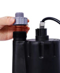 Hand attaching a cap on Badass 1/4 HP Submersible Sump Pump Shifts 2000 Gallons Daily, Tough Thermoplastic Build.