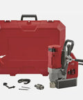 One Five Eight Inch Compact Electromagnetic Drill With 13 Amp High Torque Motor And Two Speed Transmission For Hella Fast Hole Cutting On Flat Steel Surfaces And Job Site Durable Build with tools in red case.
