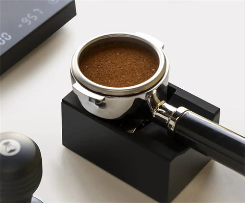 Solid Kickass Coffee Tamping Station With Integrated Espresso Scale Base And Grippy Silicone Portafilter Rest for quick coffee weighing.