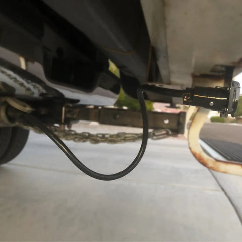 Top Shelf 3 Foot 7 Way Trailer Plug Socket Extension Cable With Heavy Duty Double Prong Copper Terminals crafted for RV and fifth wheel towing, connected under truck.