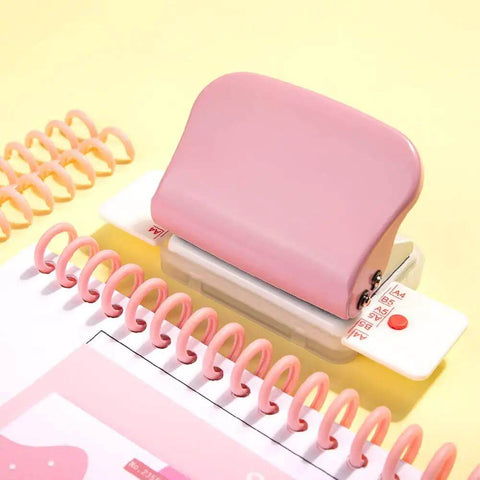 Pink six hole puncher for loose leaf notebooks, handheld metal circle puncher, A4 A5 B5 scrapbooks, clean cut holes, 5 sheet capacity