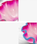 Close-up view of USZWBY Vessel Sinks Bathroom Vessel Sink Tempered Glass Wash Basin with vibrant pink color and ruffled edge.