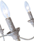 Close-up of vintage rust arm detail of 6-Light French Country Farmhouse Chandelier for Dining Room and Living Room.