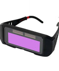 Badass Auto Darkening Welding Goggles with Instant Arc Sensing, black thermoplastic construction, comfortable fit for welding tasks.