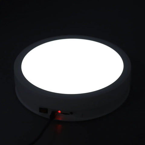 Check Out This Sick Electric Rotating Display Stand With Remote Control For Smooth 360 Degree Videos, Adjustable Speeds, USB Power, And Colorful LED Lights Perfect For Pro Product Photography Sessions - close-up of the LED base with USB input.