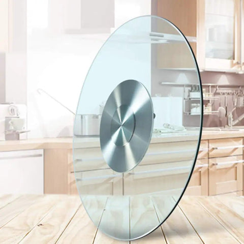Kickass Heavy Duty Lazy Susan Turntable With Thick Tempered Glass Top And Stainless Steel Bearings for smooth spinning on a kitchen table.