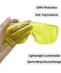 Heavy Duty Anti Fog Yellow Safety Goggles Real Deal Protective Eyewear Built To Go Over Prescription Specs For Dental Labs Teeth Whitening And Smooth Daily Construction Work in a hand, showcasing lightweight wrap around design.