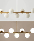 Groovy Mid Century Modern Pendant Light Set Featuring Sleek Glass Globes and Gold Finish Perfect for Kitchen Island or Dining Room with Seven Bulbs for a Rad Lighting Vibe and Dimmable LED Compatibility showcasing white glass globes.