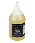 Pro Grade Industrial Strength Air Tool Lubricant For Pneumatic Tools One Gallon Heavy Duty Oil bottle with label visible.