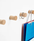 No Fuss Solid Wood Wall Hooks Holds Bags Hats And Coats Game Changer In Home Organization Multi Purpose Coat Rack And Towel Holder with blue bag