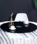 Heavy Duty Tempered Glass Rotating Serving Tray With Premium Steel Bearings Massive Lazy Susan on dining table with two cups.