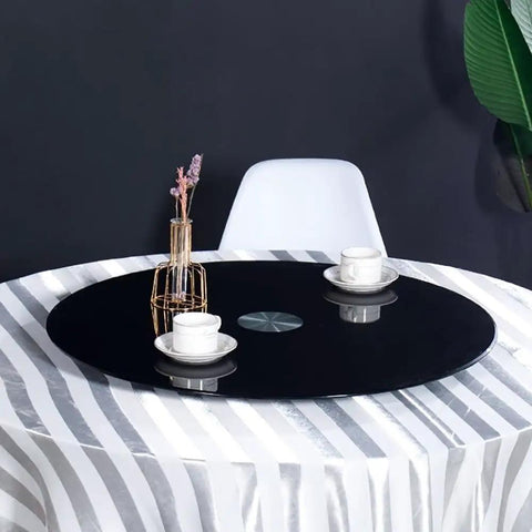 Heavy Duty Tempered Glass Rotating Serving Tray With Premium Steel Bearings Massive Lazy Susan on dining table with two cups.