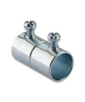 Heavy Duty 1 In Emt Conduit Couplers With Set Screw Design In Zinc Steel For Secure Electrical Grounding And Professional Construction Projects Fasteners Hardware Assortment Pkg Qty 10 Ready To Use Today, showing a zinc steel coupler with two screws.