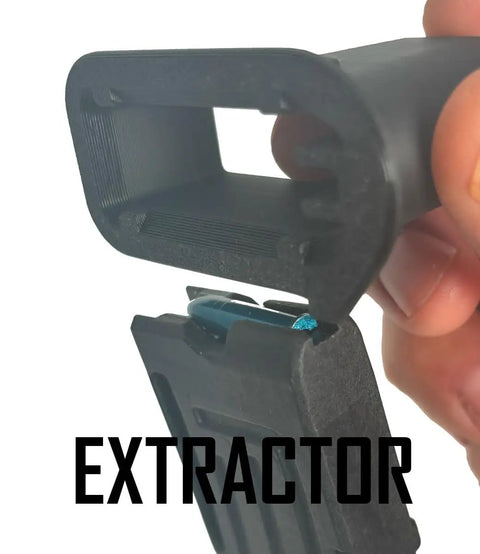 Close-up of TM22 22LR Magazine Speed Loader Quickie Loader with built-in bullet extractor, ergonomic biopolymer design, black.