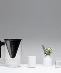 10 Cup Filtered Water Pitcher With Bamboo Handle, BPA Free Plastic, Clean Taste And Odor, Home Water Purifier on table