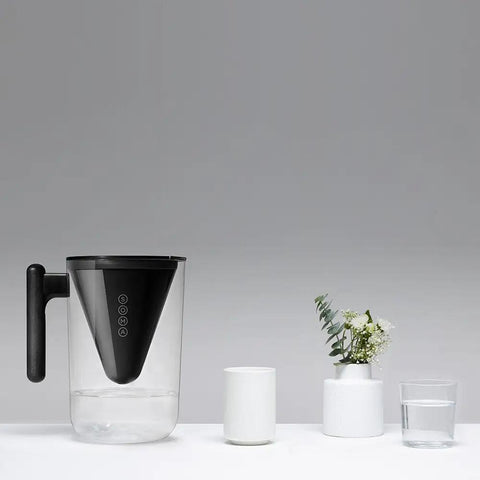 10 Cup Filtered Water Pitcher With Bamboo Handle, BPA Free Plastic, Clean Taste And Odor, Home Water Purifier on table