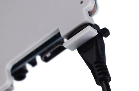 Close-up of the solid grip Din rail mount for Raspberry Pi showing micro USB strain relief and nylon casing details.