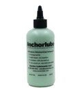 Front view of Anchorlube All-Purpose Metalworking Compound bottle, 8 oz, green plastic with black cap