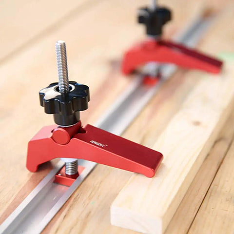 Rock Solid Aluminum T Track Hold Down Clamps For Woodworking And Metalworking Projects Plus Quick Slide In T Slot Press Clamps on wooden surface.
