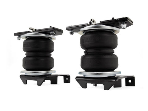 Level That Heavy Tow Rig With Air Spring Kit And Wireless Compressor featuring dual rubber bags for Ram 3500 truck.