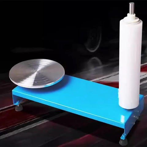 Heavy Duty Manual Pallet Stretch Wrap Machine With Quick Film Dispenser And 30 Cm Rotating Turntable on blue base with silver turntable.