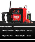 Solary SD101 automotive smoke leak tester kit in red with coiled hose, oil fluid bottle and assorted adapters.