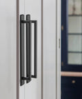 Modern Matte Black Cabinet Pull Handle With Backplate Featuring Grooved Texture And Non Slip Grip For Farmhouse And Industrial Kitchen Cabinets Goo Ki Two Pack Seven And Nine Sixteenths Inch installed on cabinet door