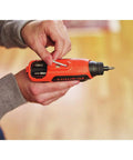 Person using 4V Max Cordless Electric Screwdriver With 180 RPM 8 Bits And Rotating Bit Cartridge Built In Storage LED Light For Quick Bit Access